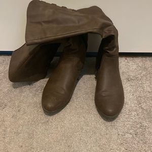 Brown knee high boots. Worn once.